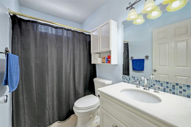 bathroom featuring decorative backsplash, vanity, toilet, and a shower with shower curtain