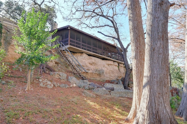187 N Roy Chisum Rd, Leakey, TX 78873 - view of yard featuring a sunroom and stairs