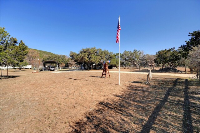 187 N Roy Chisum Rd, Leakey, TX 78873 - view of property's community with a carport