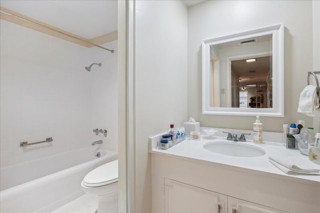 full bathroom featuring vanity, shower / bathtub combination, and toilet