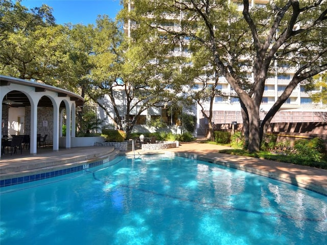 view of pool with a patio