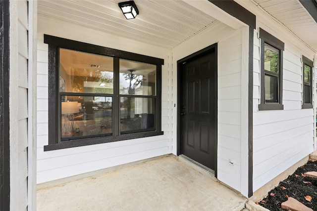 property entrance with a porch