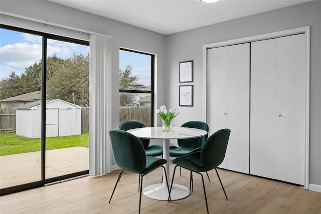 dining room featuring light hardwood / wood-style flooring