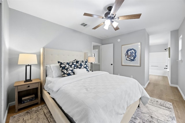 bedroom featuring ceiling fan and light wood-type flooring