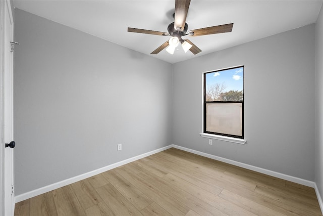 unfurnished room featuring ceiling fan and light hardwood / wood-style flooring