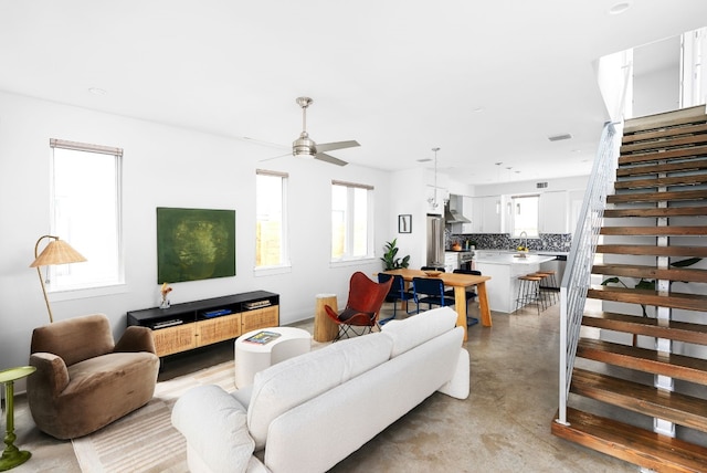 living room with ceiling fan