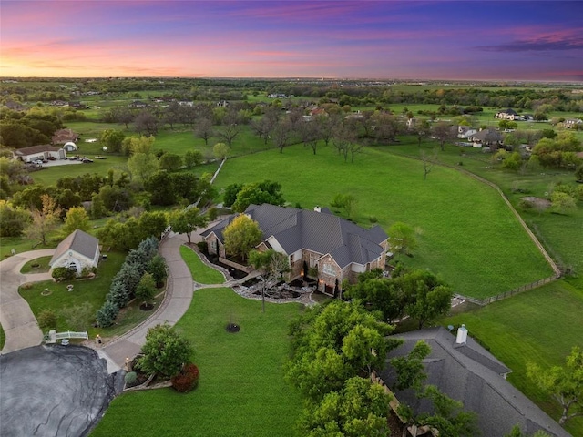 view of aerial view at dusk