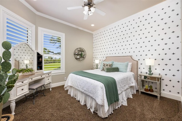 bedroom with ceiling fan, crown molding, and dark carpet