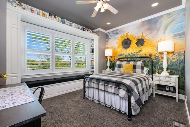 carpeted bedroom featuring ceiling fan and crown molding