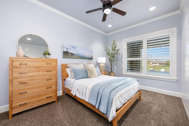 bedroom with ceiling fan, dark carpet, and ornamental molding