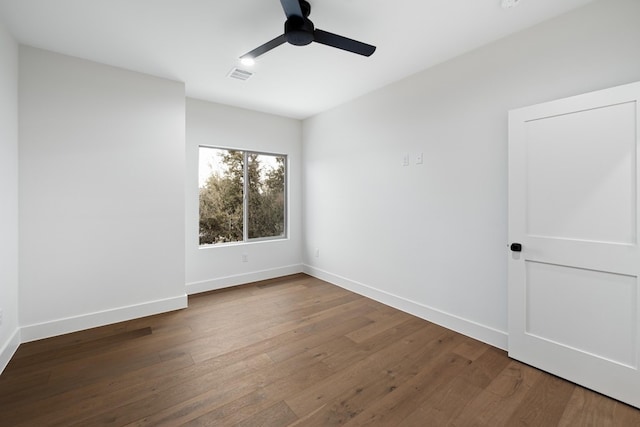 spare room featuring ceiling fan and wood-type flooring