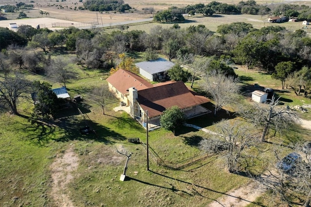 birds eye view of property featuring a rural view