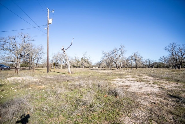 view of yard featuring a rural view