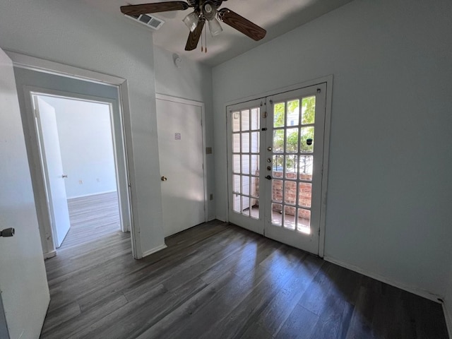 entryway featuring french doors, ceiling fan, and dark wood-type flooring