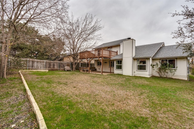 view of yard featuring a patio area and a deck