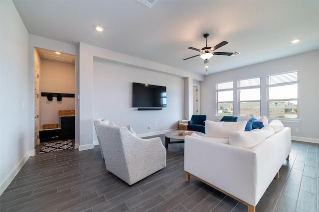 living room featuring ceiling fan