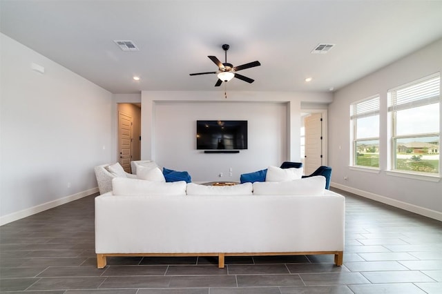 living room featuring ceiling fan