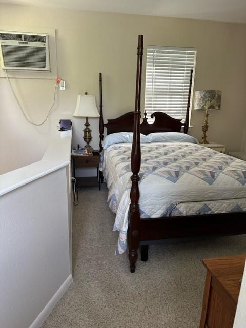 bedroom featuring carpet flooring and a wall mounted AC