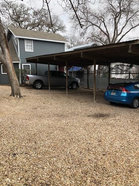 view of car parking with a carport