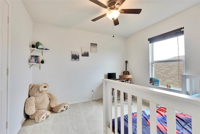 bedroom featuring ceiling fan and carpet floors