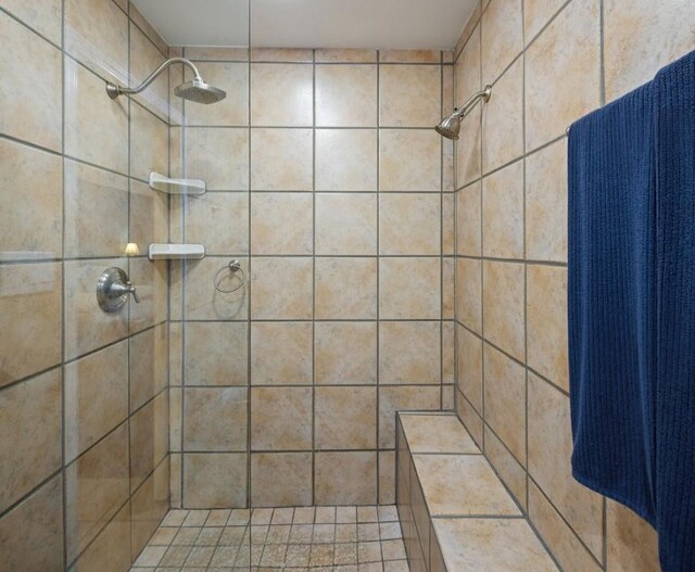 408 Silver Spur, Horseshoe Bay, TX 78657 - full bathroom featuring a tile shower