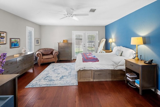 bedroom featuring french doors, dark hardwood / wood-style floors, and ceiling fan