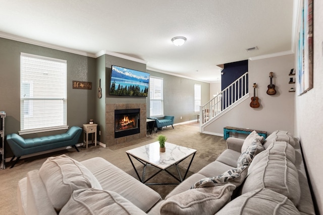 carpeted living room featuring a fireplace and ornamental molding