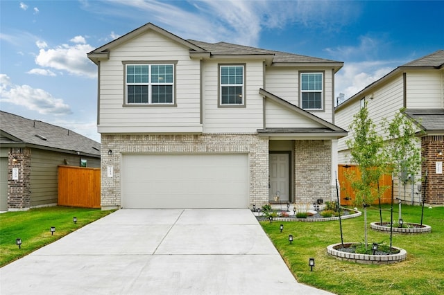 front facade featuring a garage and a front lawn