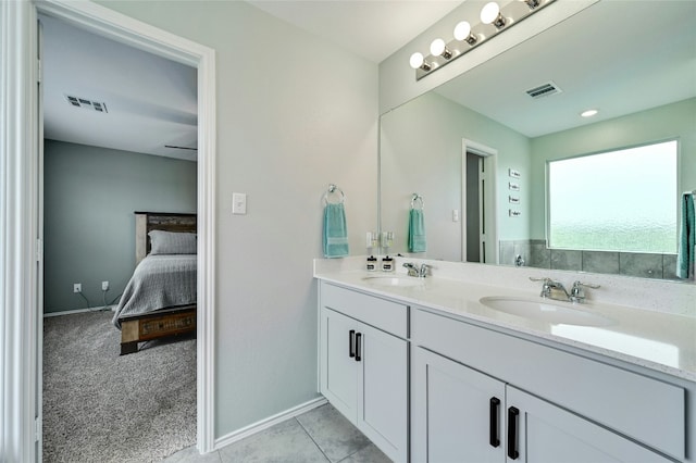 bathroom featuring tile patterned floors and vanity