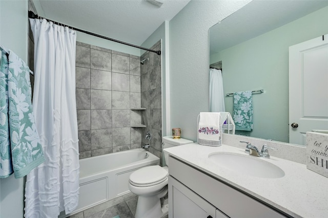 full bathroom featuring shower / tub combo, vanity, a textured ceiling, tile patterned flooring, and toilet