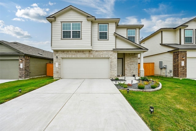 view of front of property featuring a garage and a front lawn