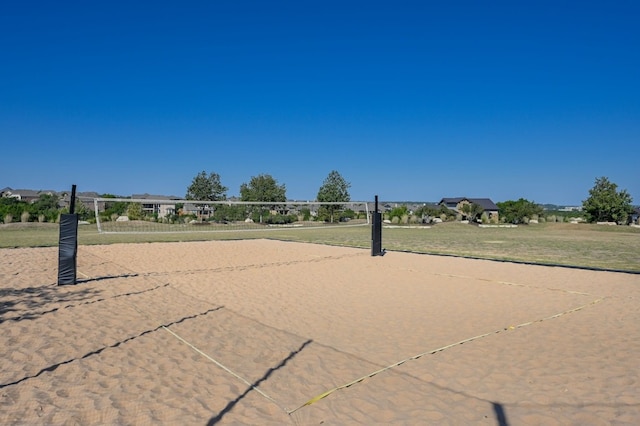 view of property's community featuring volleyball court