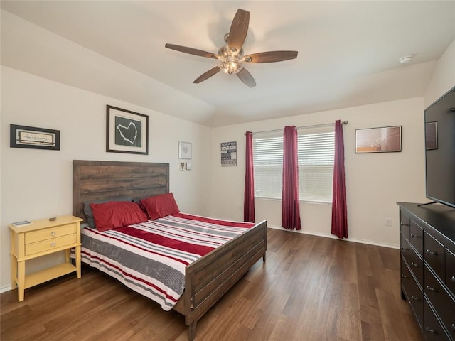 bedroom with ceiling fan and dark wood-type flooring