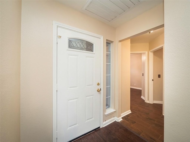 foyer entrance featuring dark hardwood / wood-style flooring