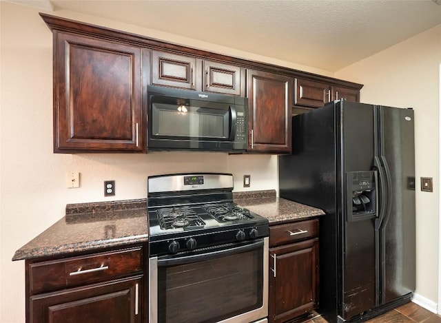 kitchen featuring dark brown cabinets and black appliances