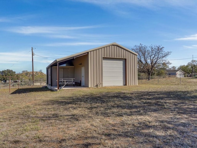 view of outdoor structure featuring a garage