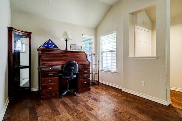 home office with dark hardwood / wood-style flooring and lofted ceiling