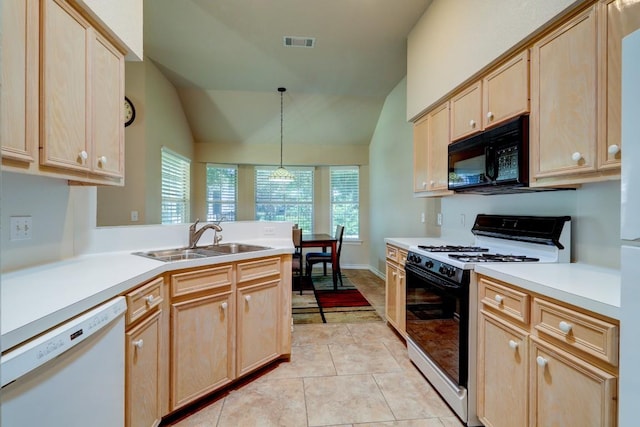 kitchen featuring light brown cabinetry, white dishwasher, range with gas cooktop, and sink