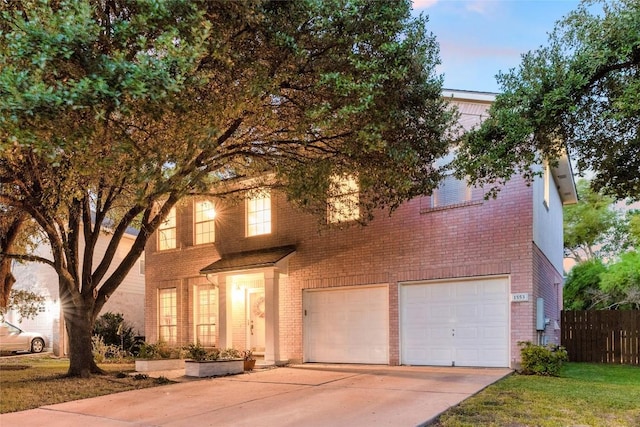 view of front of property with a garage