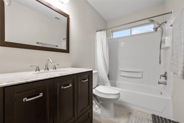 full bathroom with vanity, a textured ceiling, shower / bath combo with shower curtain, tile patterned flooring, and toilet