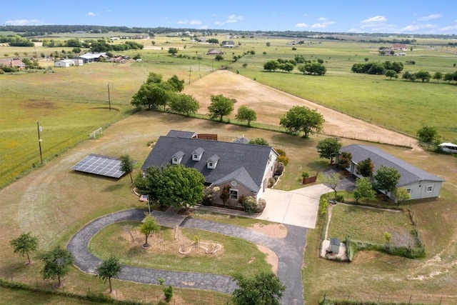 birds eye view of property featuring a rural view