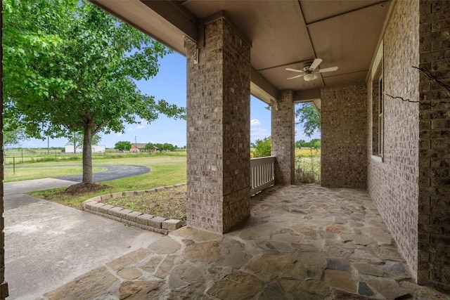 view of patio with ceiling fan