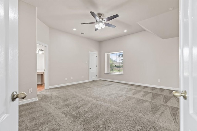 spare room with carpet flooring and ceiling fan