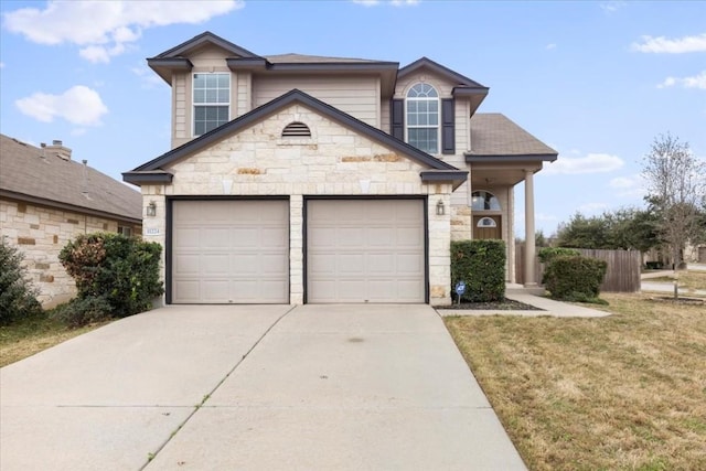 view of front property with a garage and a front lawn