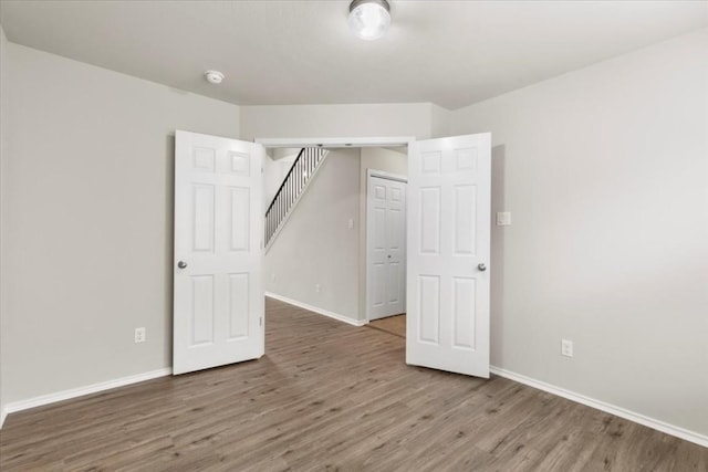 empty room featuring hardwood / wood-style floors