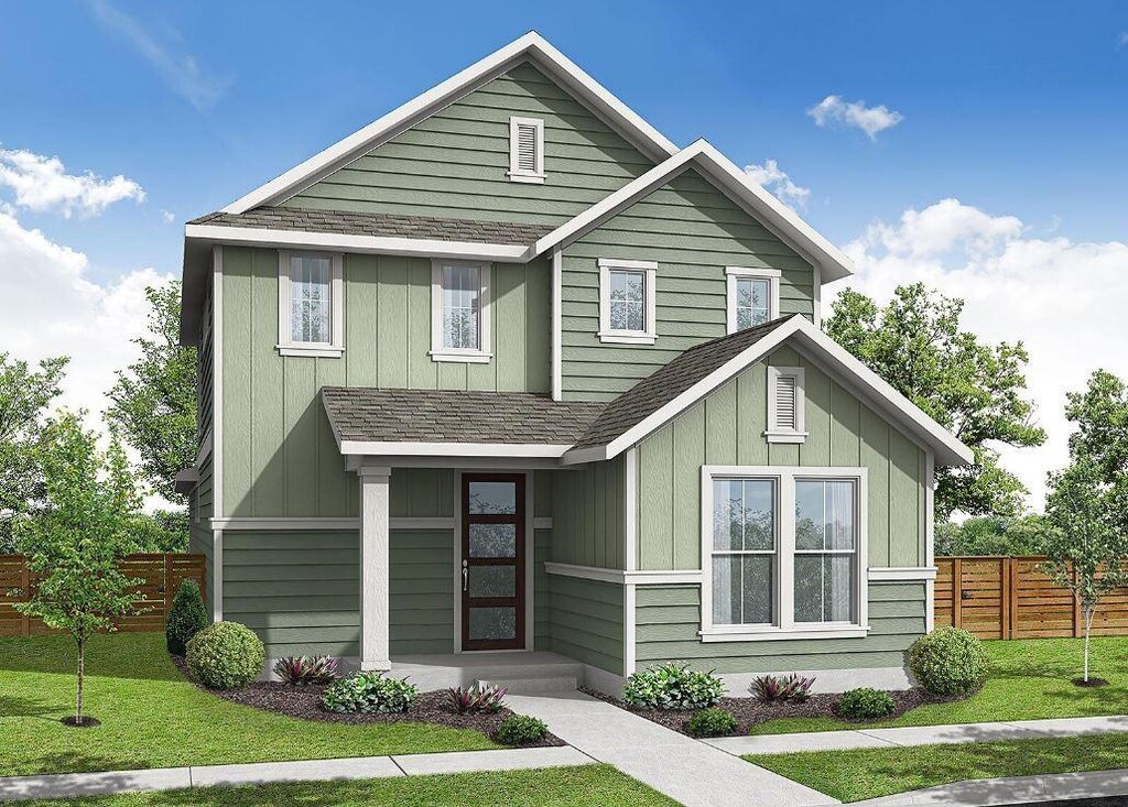 view of front of property with a front lawn