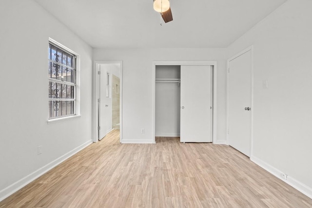 unfurnished bedroom featuring a closet, ceiling fan, and light hardwood / wood-style floors