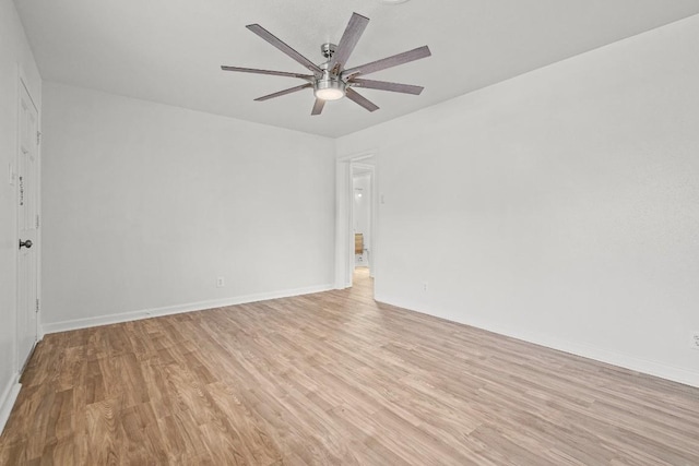 unfurnished room with ceiling fan and light hardwood / wood-style flooring