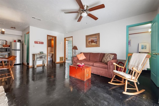 living room featuring ceiling fan