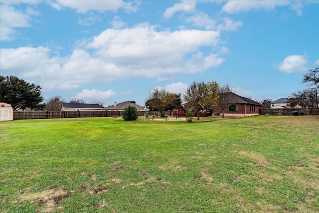 view of yard with a fenced backyard